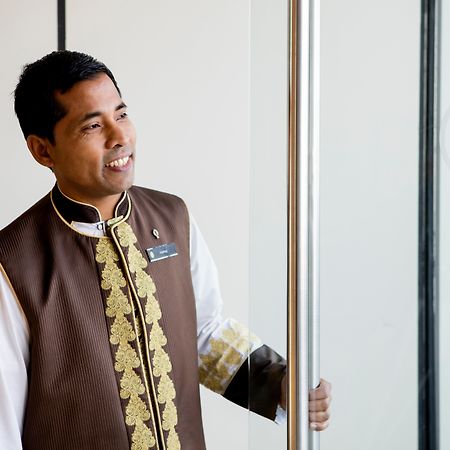 Intercontinental Dubai Festival City By Ihg Eksteriør billede A hotel doorman in Dubai